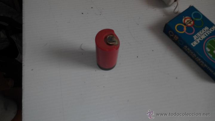 Mecheros: mechero clipper regulable con portamechero
