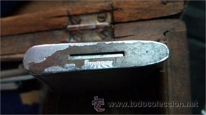 Mecheros: Defecto con desconche en la base . - Foto 3