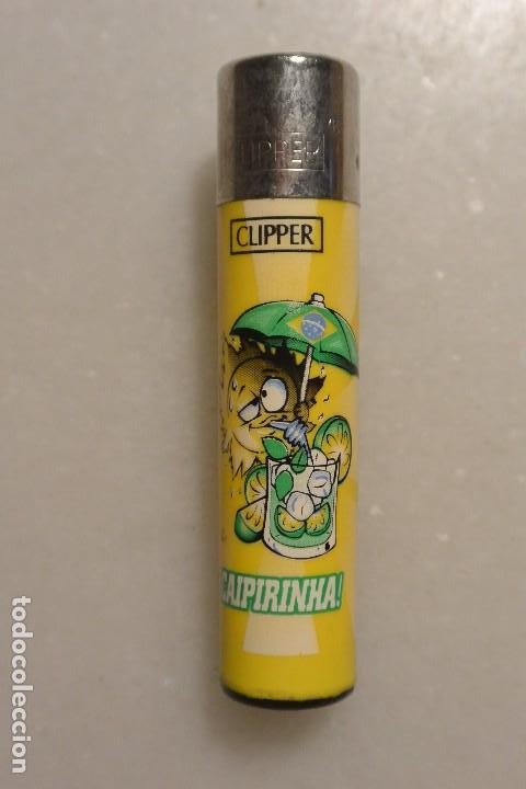 Mecheros: Mechero clipper amarillo, RASCADOR REDONDO