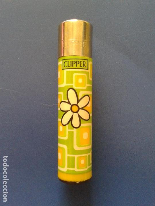 Mecheros: MECHERO ENCENDEDOR CLIPPER FLOR FONDO AMARILLO