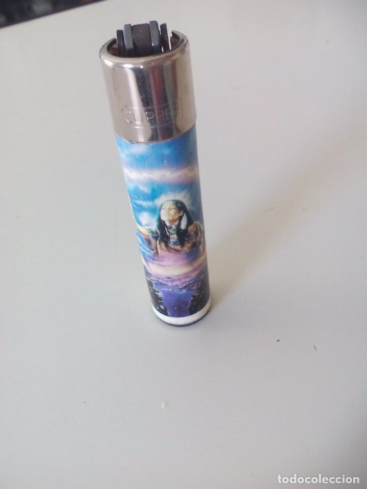 Mecheros: Mechero clipper. 1999 Meiklejohn graphics UK Lighter