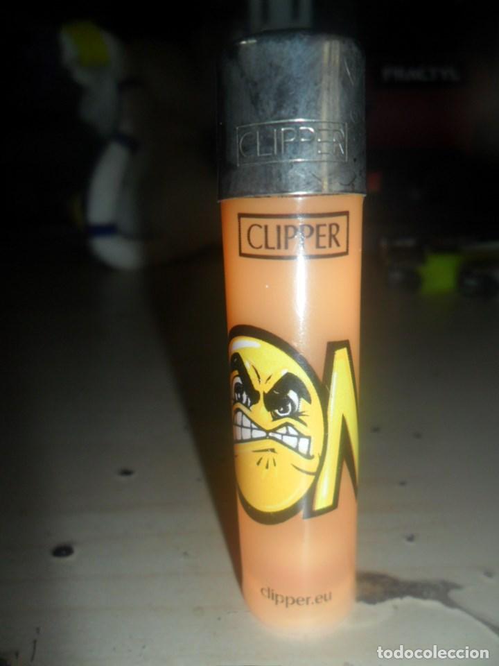 Mecheros: MECHERO CLIPPER EMOTICONO EMOJI ON - TRANSLUCIDO - RECARGABLE