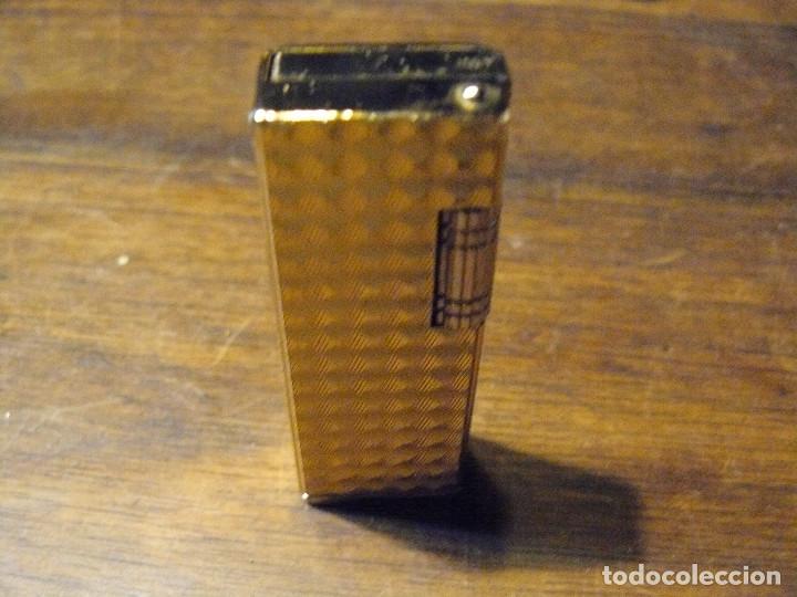 Mecheros: ELEGANTE MECHERO MARCA CHAMP - Foto 2