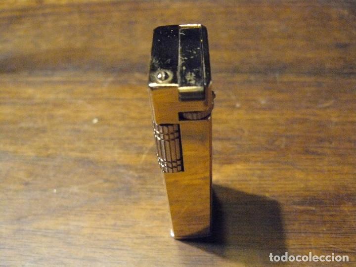 Mecheros: ELEGANTE MECHERO MARCA CHAMP - Foto 3