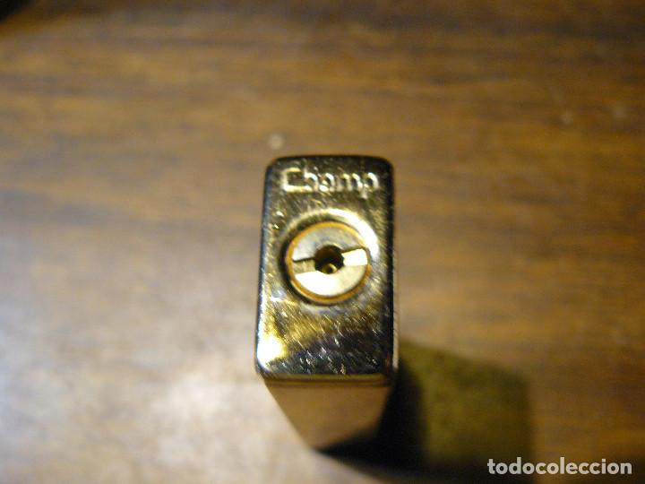 Mecheros: ELEGANTE MECHERO MARCA CHAMP - Foto 4