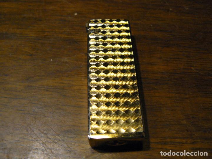 Mecheros: ELEGANTE MECHERO MARCA CHAMP - Foto 5