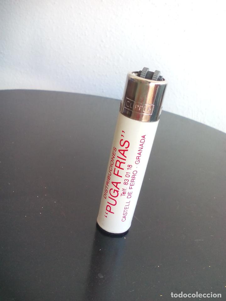 Mecheros: Mechero Clipper distribuciones Puga fr&iacute;as Castell de Ferro Granada. Encendedor.