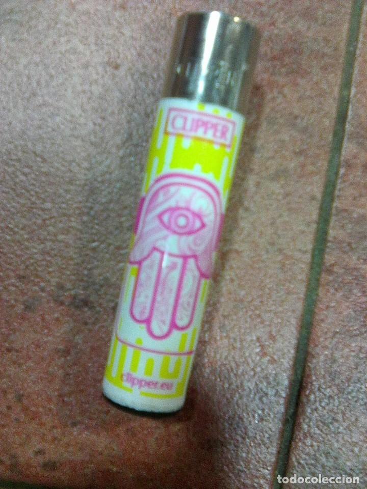 Mecheros: Mechero clipper - mano que todo lo ve - curioso
