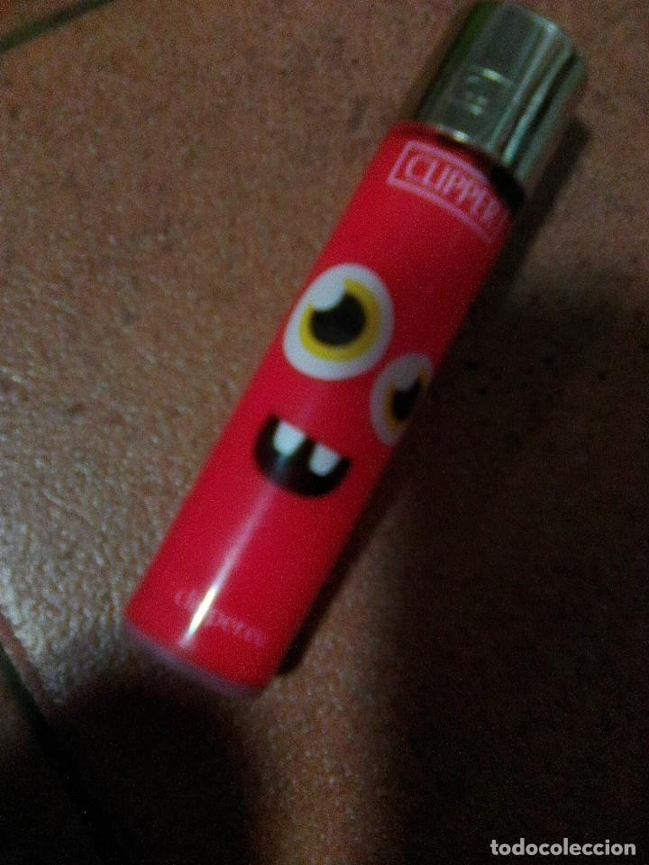 Mecheros: Mechero clipper - Rojo con carita de pena