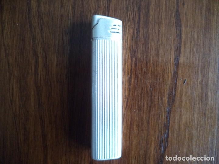 Mecheros: Encendedor Champ .Sin usar. - Foto 1