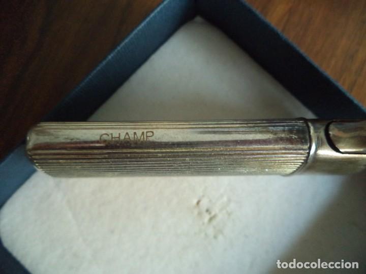 Mecheros: Encendedor Champ .Sin usar. - Foto 2