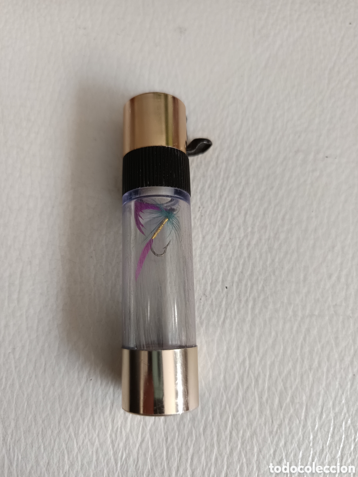 Mecheros: Mechero antiguo de gas transparente con un anzuelo