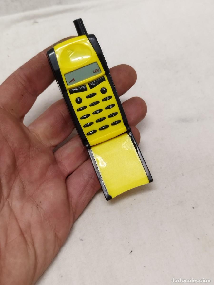 Mecheros: Mechero, en forma de telefono movil Ericsson . Publicidad Redseng t&oacute;nico general. Sin probar.