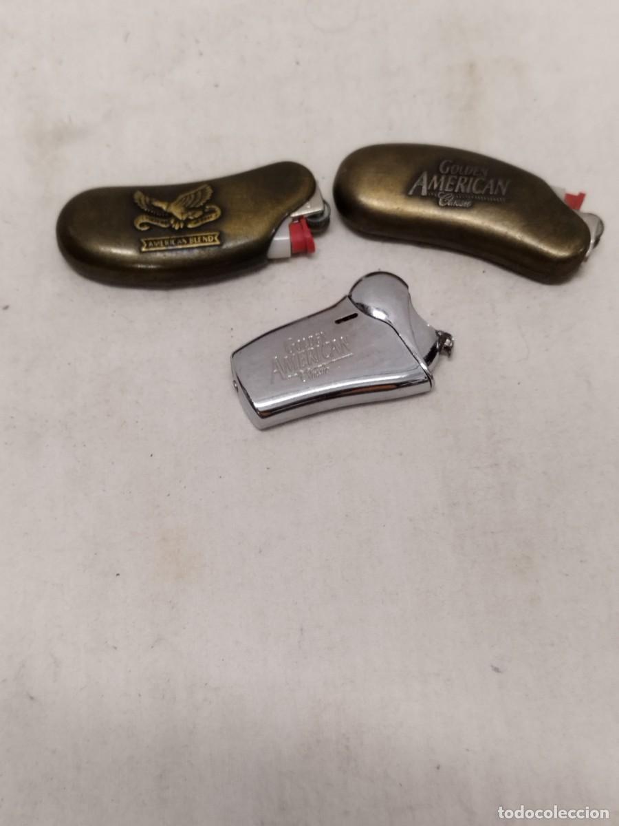 Mecheros: Lote de mechero y dos fundas met&aacute;licas para encendedor. Publicidad tabaco Golden America.