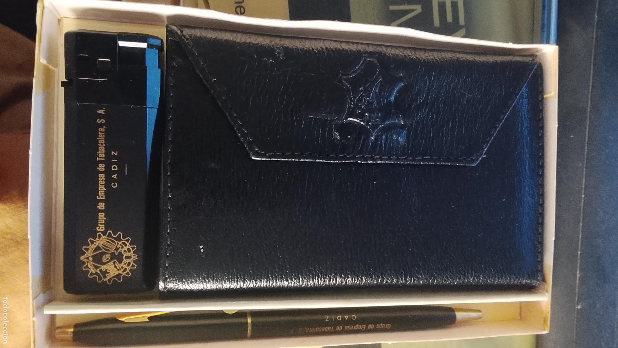 Mecheros: juego de regalo empresa tabacalera cadiz . mechero , boligrafo y cartera piel . sin uso