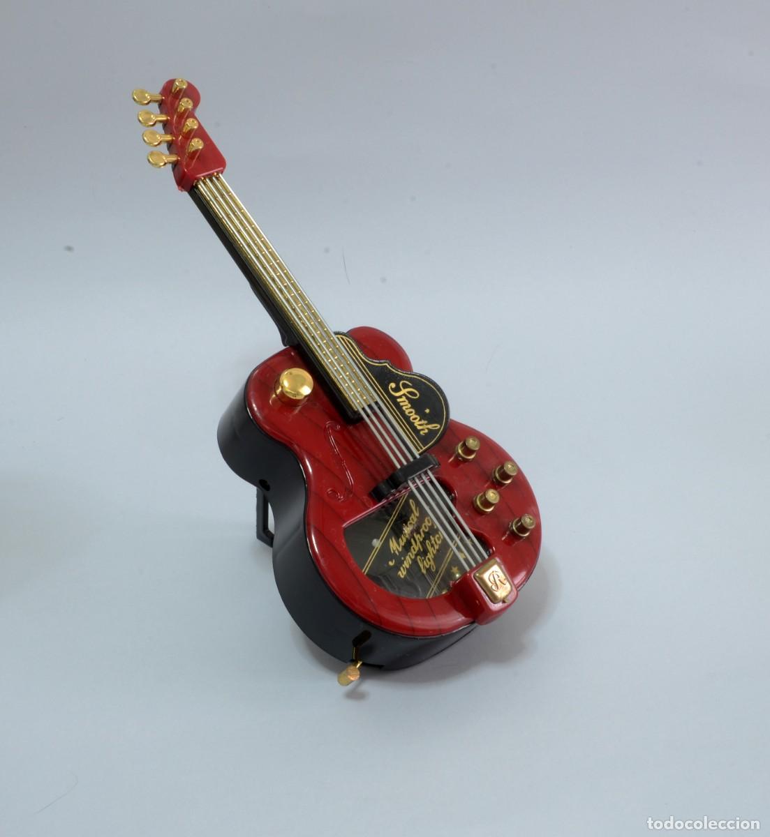 Mecheros: GUITARRA MECHERO CON CAJA DE M&Uacute;SICA Smooth Windproof