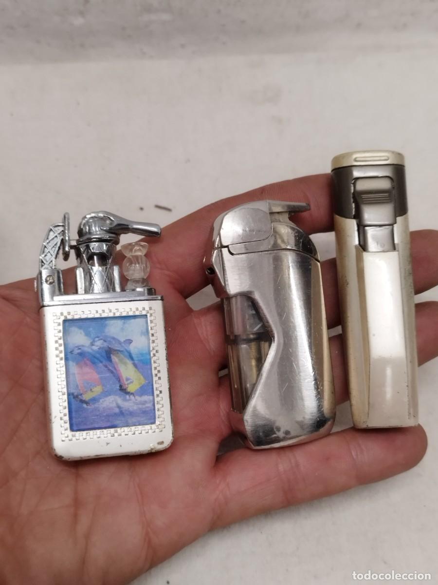 Mecheros: Lote de 3 Mecheros, encendedores antorcha. Uno con imagen 3D. Sin probar.
