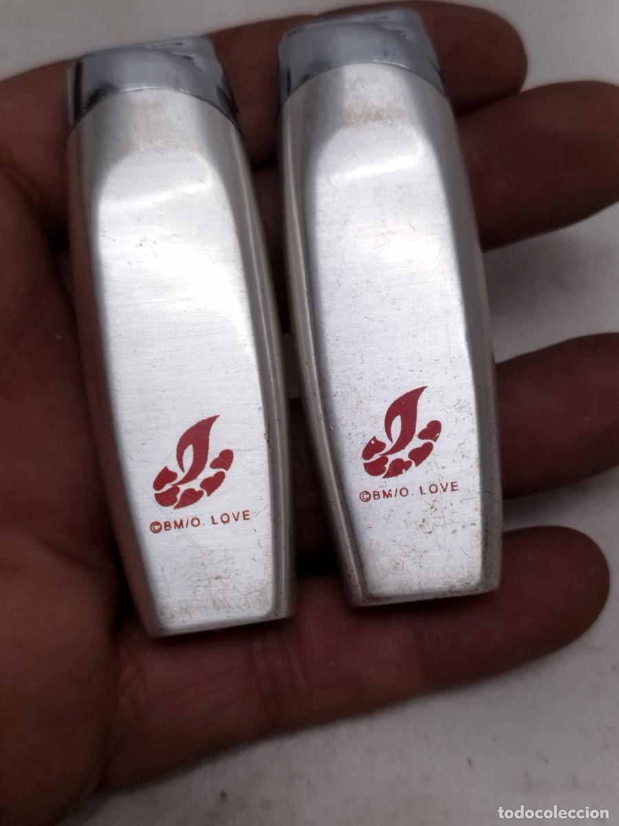 Mecheros: Lote de 2 Mecheros, encendedores publicidad BM/O Love. Sin probar.