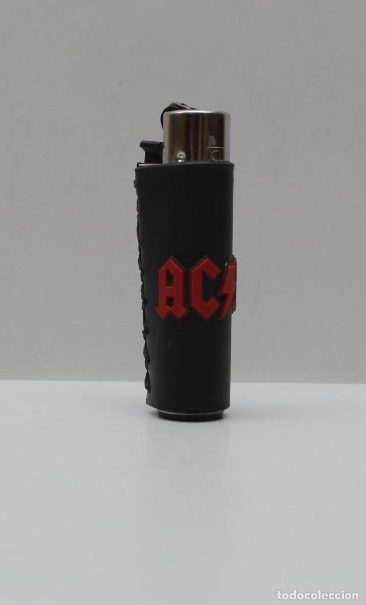 Mecheros: CLIPPER- FUNDA DE GOMA AC-DC
