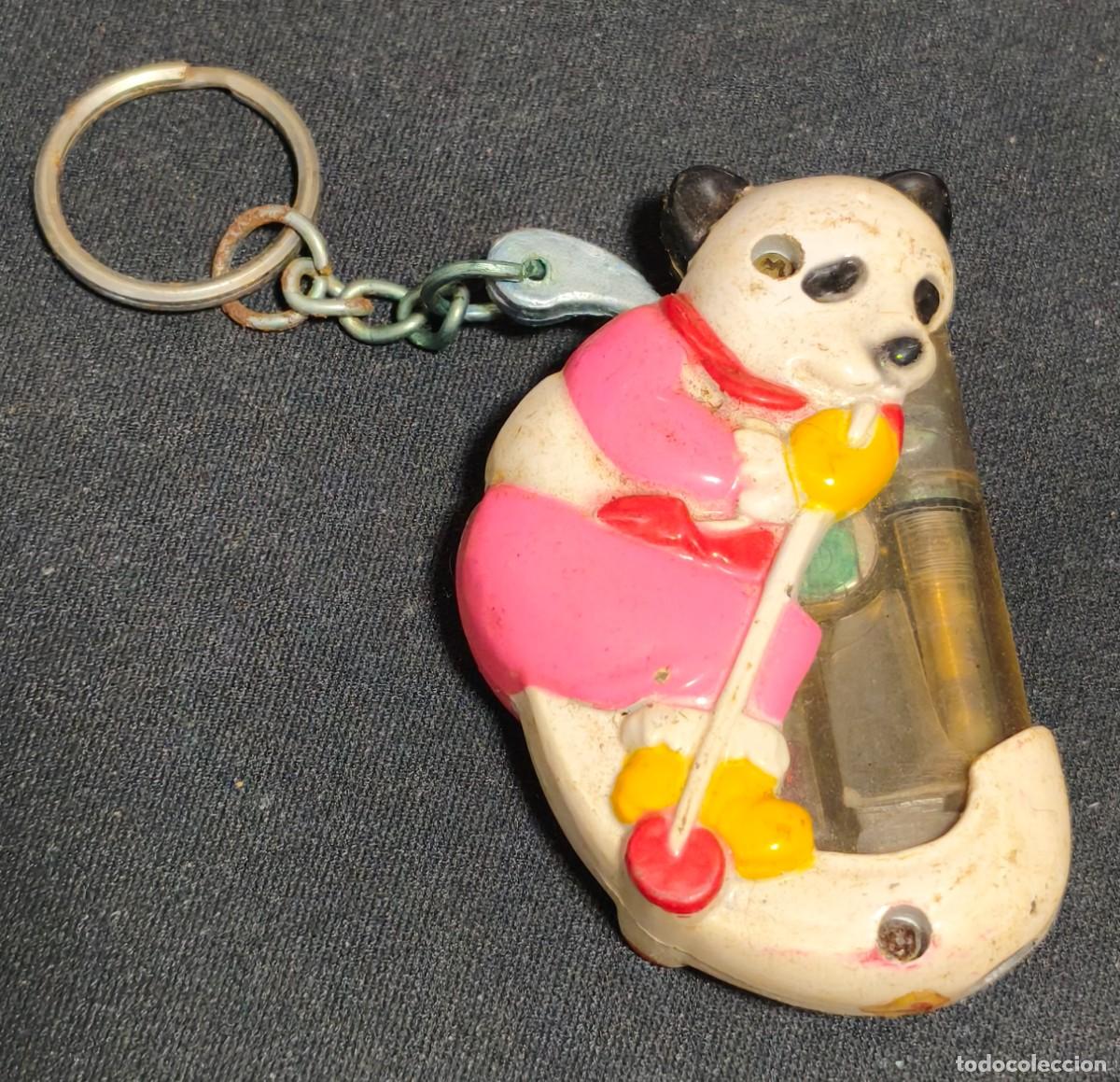Mecheros: Mechero encendedor con forma de oso panda esquiando.