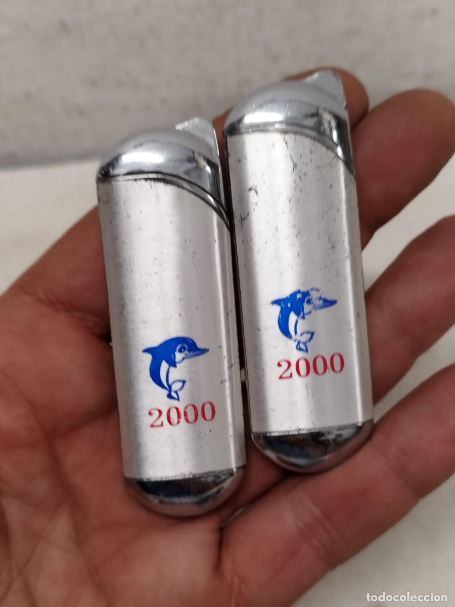 Mecheros: Dos mecheros, encendedores. Delf&iacute;n 2000, sin probar.