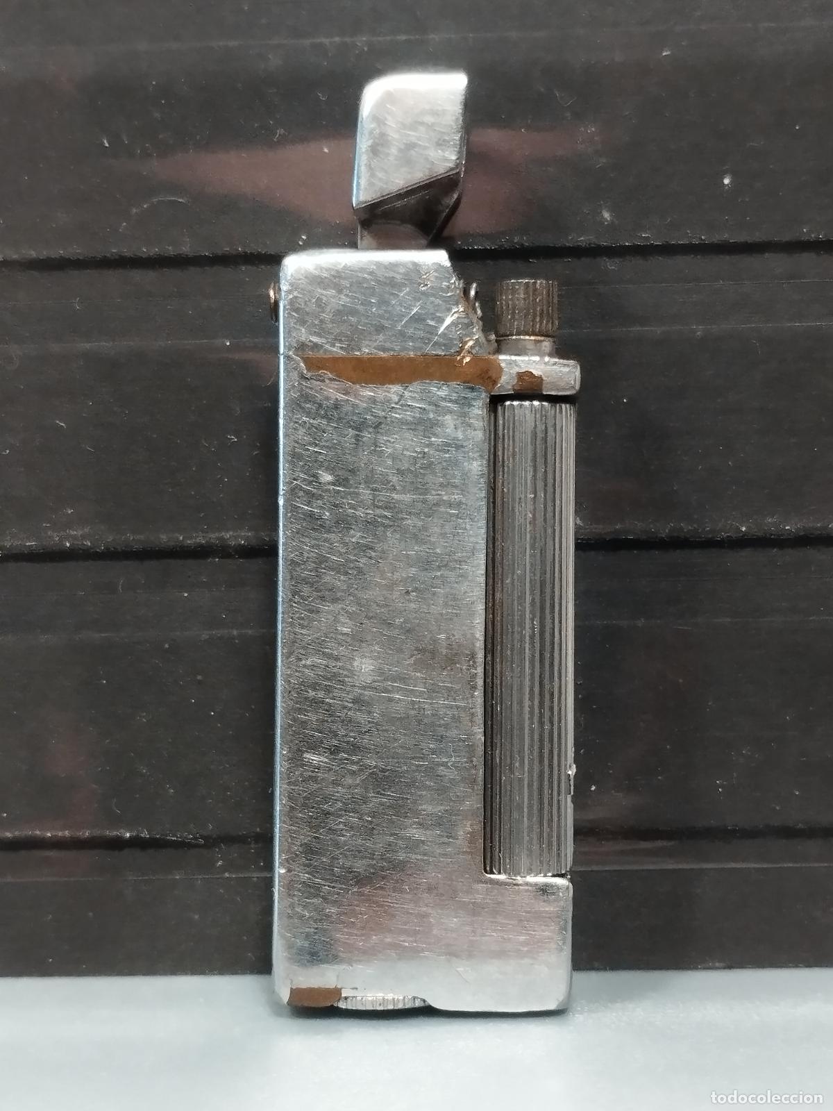Briquets: SEV M30 MECHERO DUNCANN. MADE IN USA. ALGO PEGADO. BUENA CALIDAD. VER FOTOS.