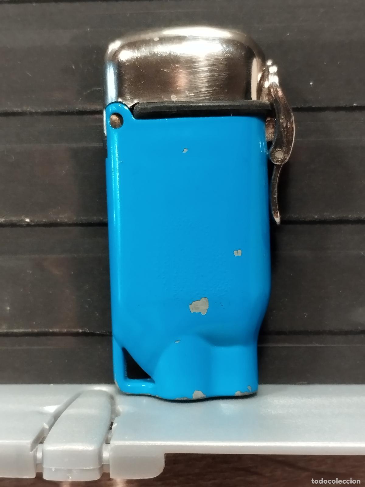 Briquets: SEV M19 MECHERO SIN MARCA. COLOR AZUL OSCURO. BUENA CALIDAD.