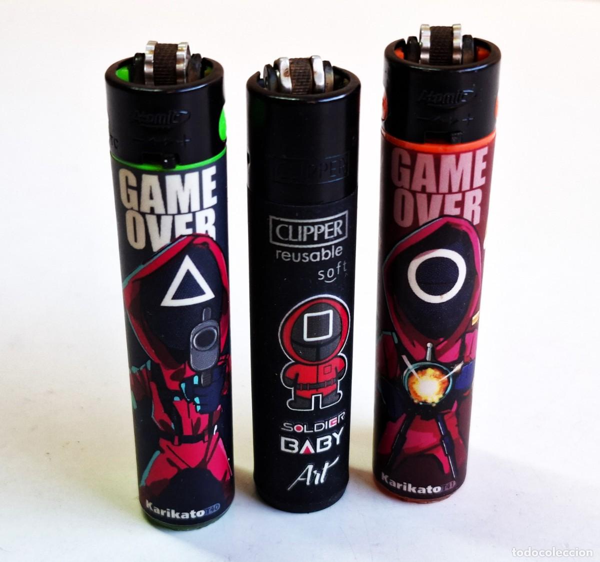 Isqueiros: SQUID GAME - TRES MECHEROS RASCADOR CLIPPER - SI FUNCIONAN