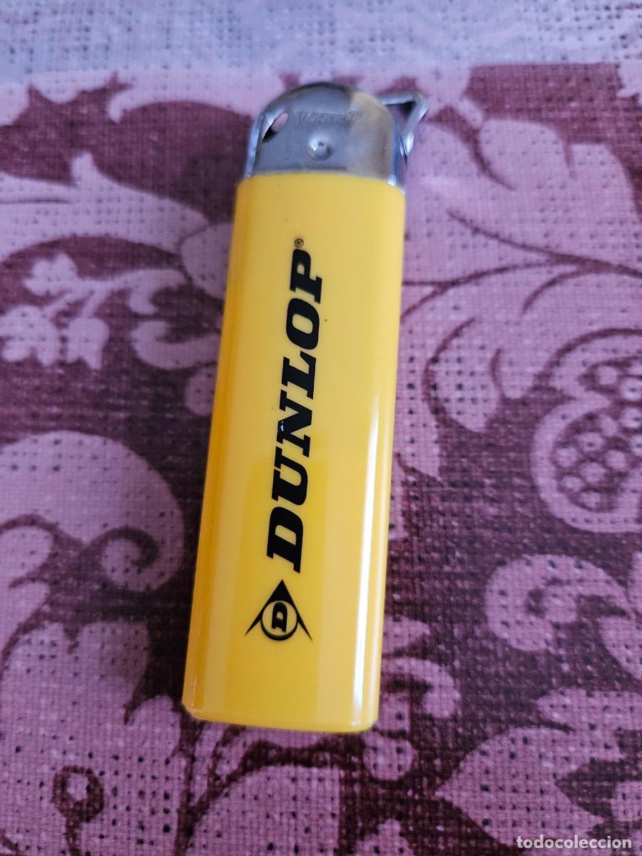 Mecheros: Encendedor/ Mechero De Gas En Pl&aacute;stico Color Amarillo Con El Logo DUNLOP En Negro, Troppo.