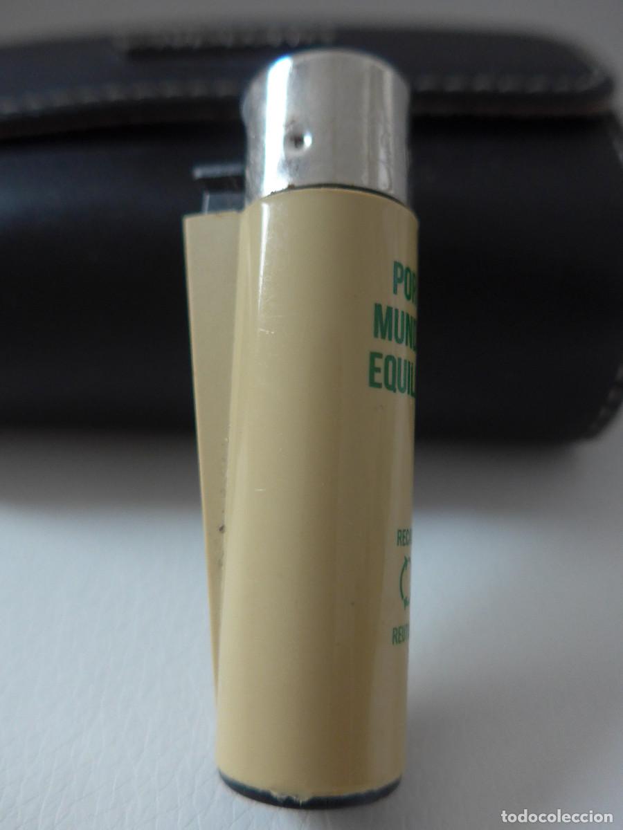 Mecheros: MECHERO ENCENDEDOR CLIPPER POR UN MUNDO EN EQUILIBRIO