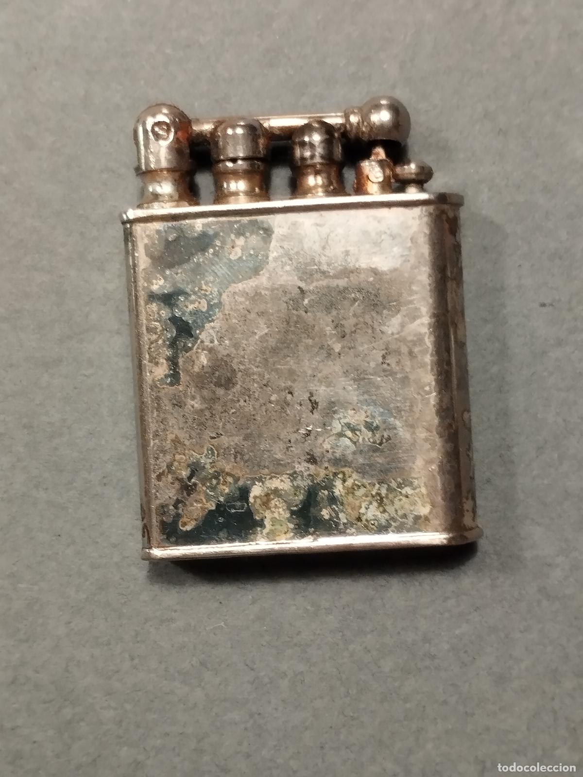 Feuerzeuge: FAC 83 MECHERO SIN MARCA VISIBLE. ALGO DESGASTADO.