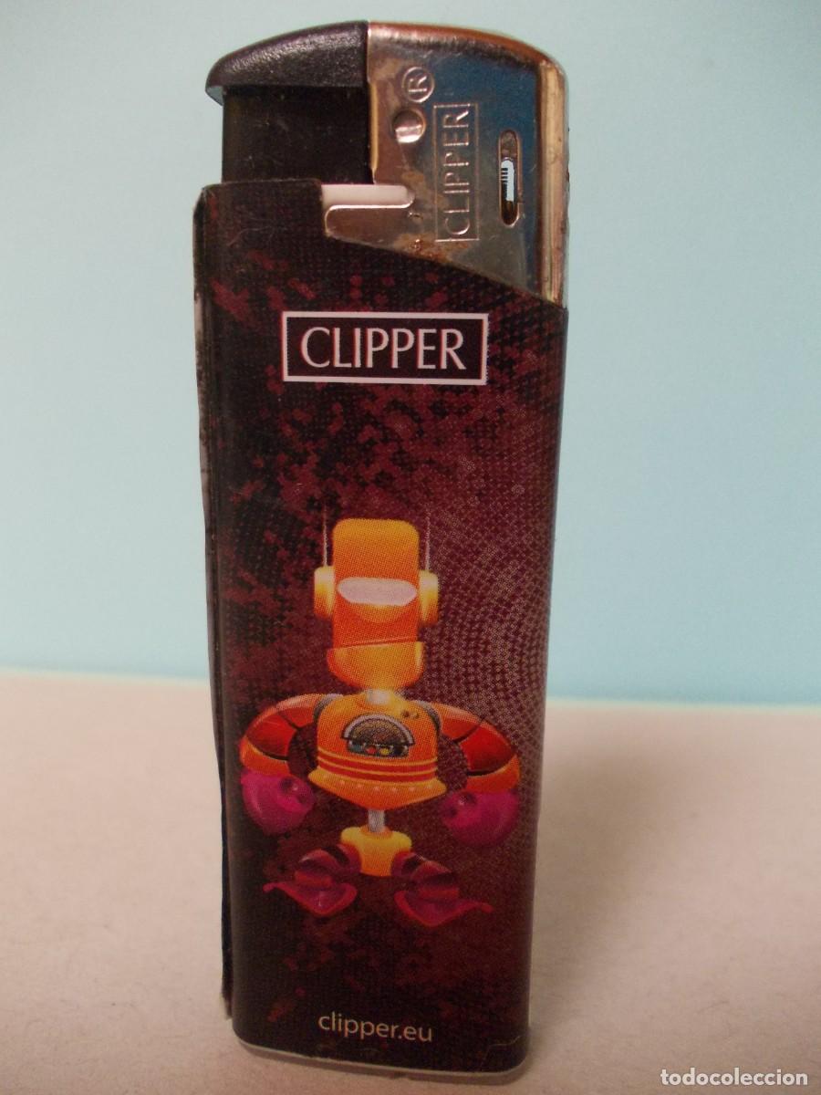 Briquets: Mechero Clipper original encendedor piedra serie dibujo robot naranja bcn descatalogado