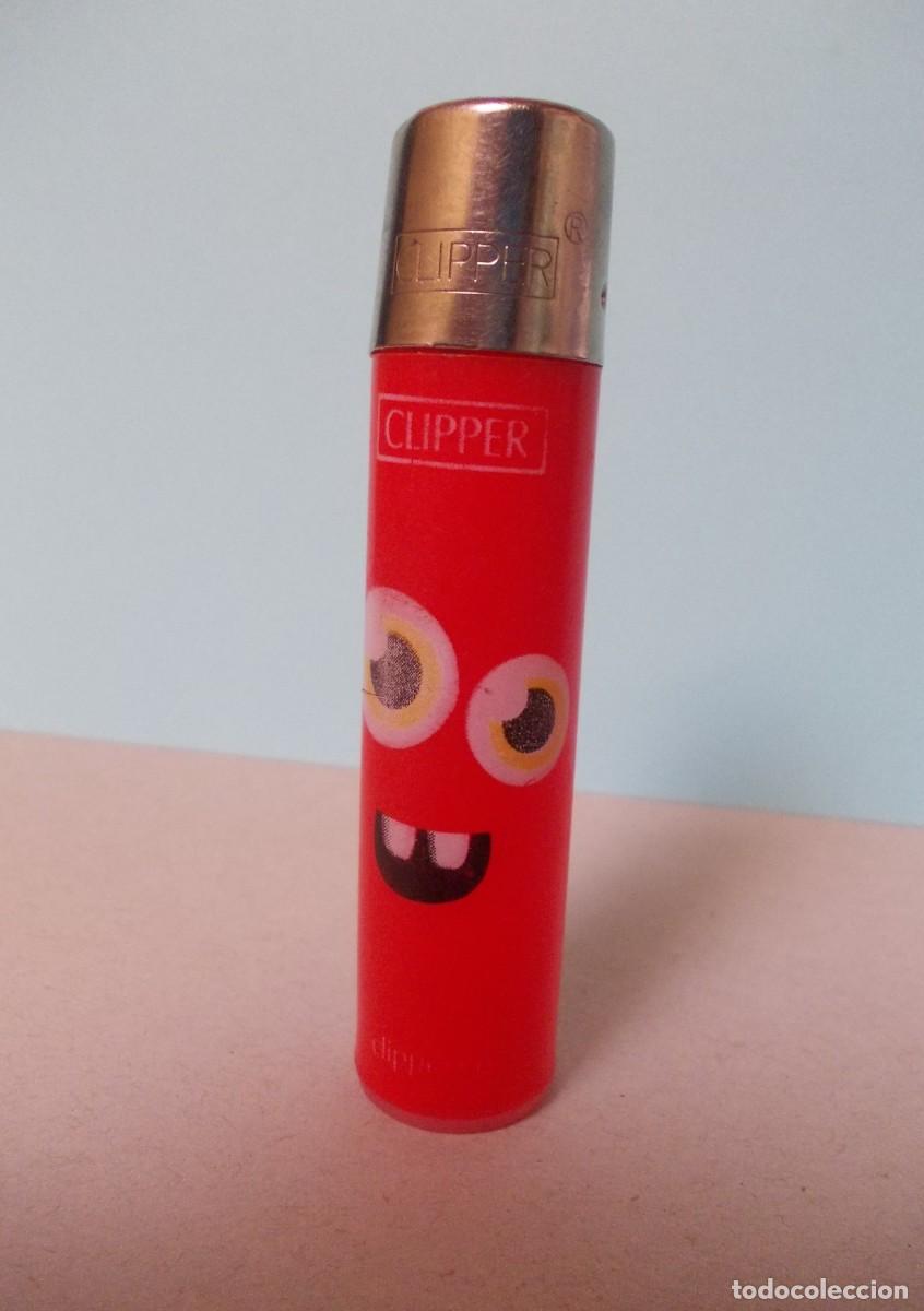 Briquets: Mechero Clipper original encendedor piedra rojo dibujo cara ojos sonrisa retro descatalogado
