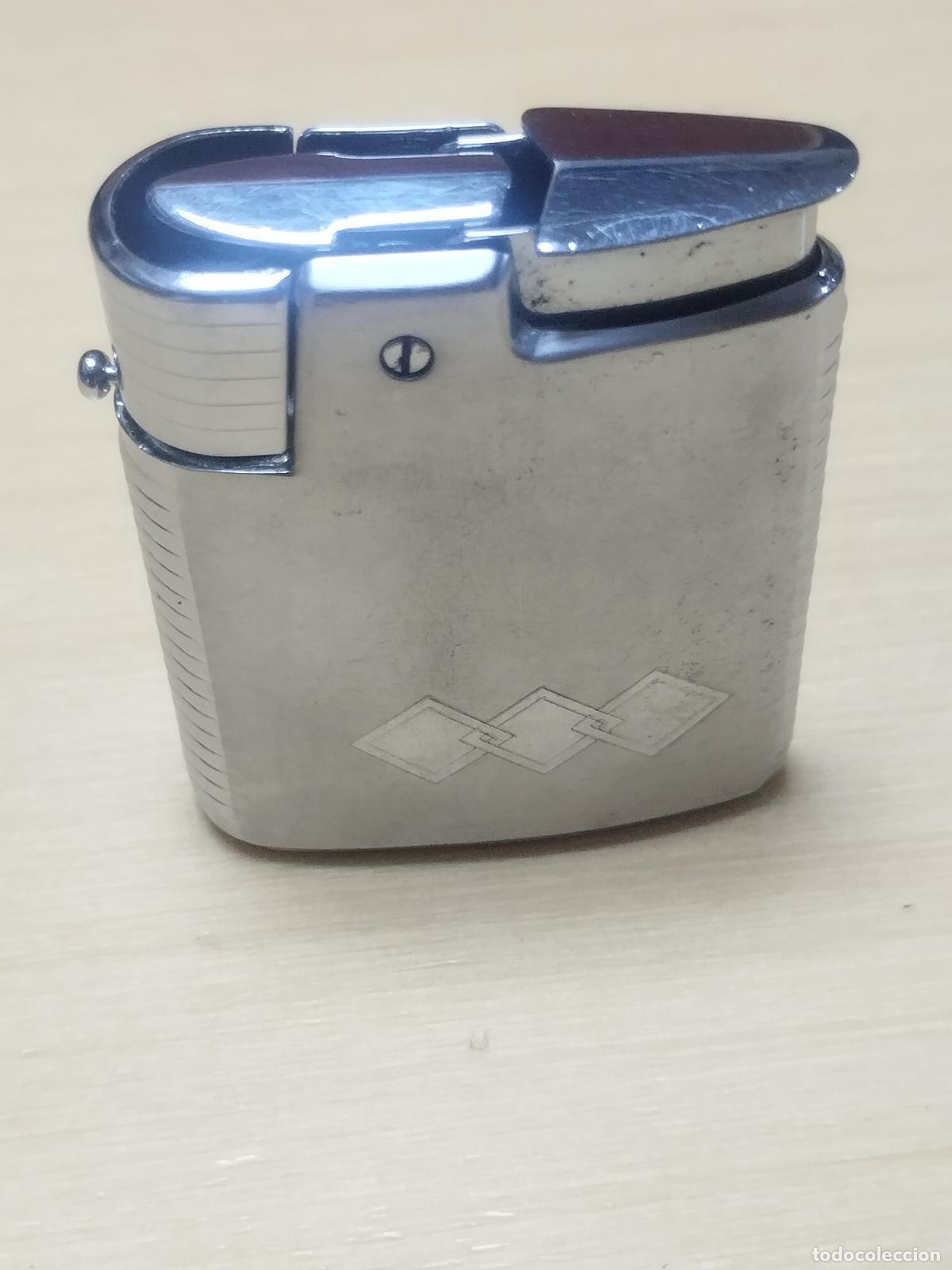 Briquets: BZB 173 MECHERO RONSON. MADE IN ENGLAND. MEDIDAS 5.5 CM * 4.5 CM . VER FOTOS ADJUNTAS.