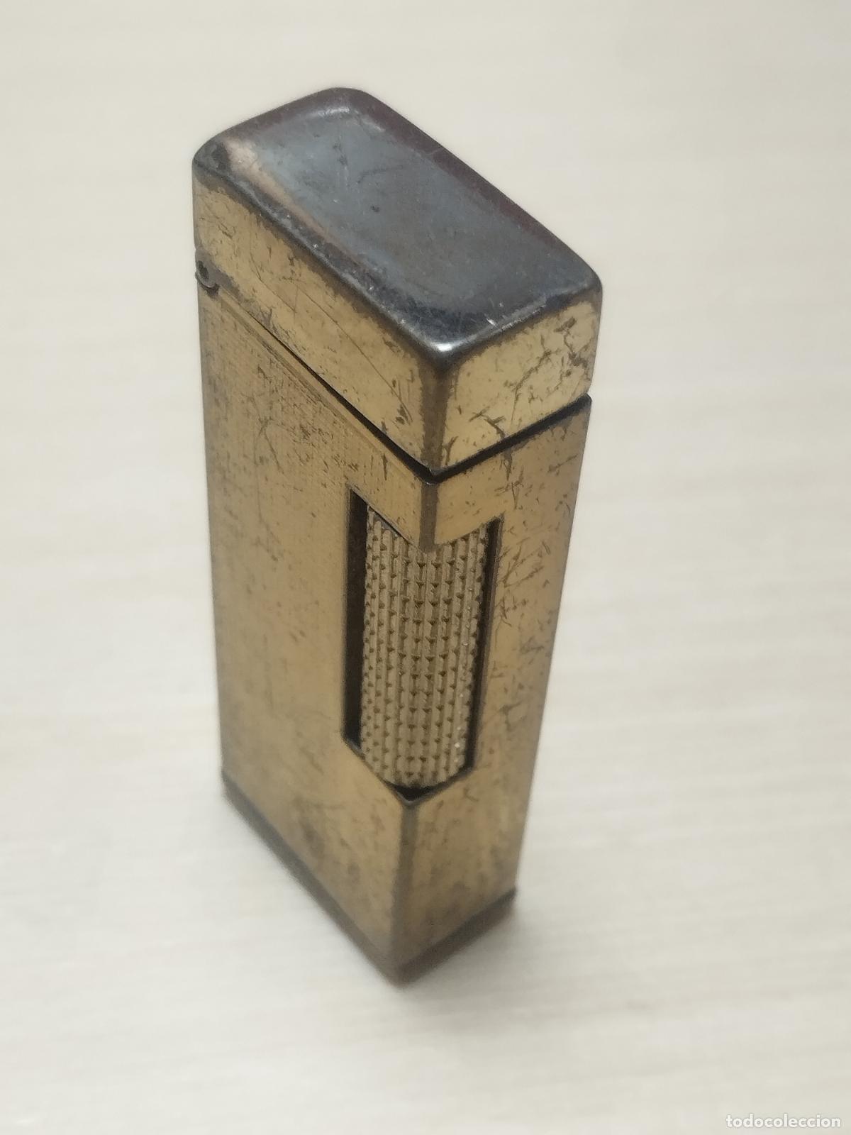 Briquets: BZB 164 MECHERO MICO AUTOMATIC DE LUXE. MEDIDAS 6,5 CM* 2,5 CM. ALGO ROZADO . VER FOTOS ADJUNTAS.