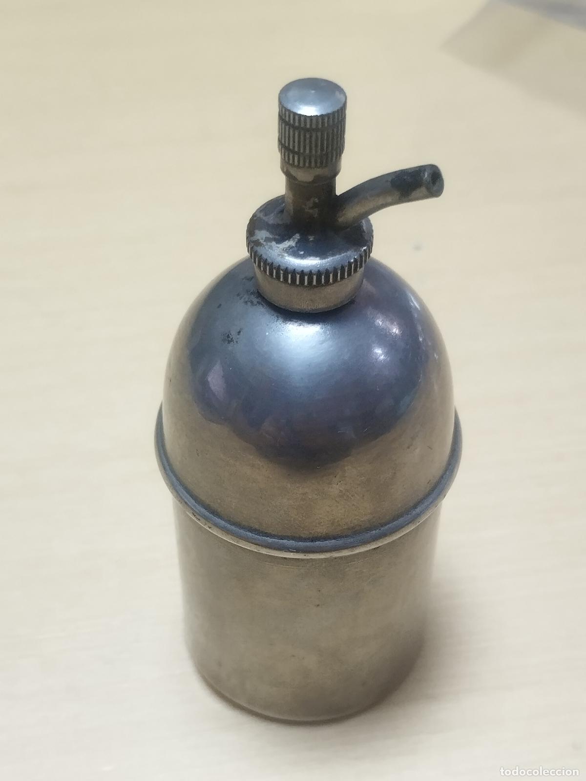 Briquets: BZB 143 CARGADOR DE MECHERO. PRESTO PATENT. MEDIDAS APROX 9*4 CM. BUENA CONSERVACION