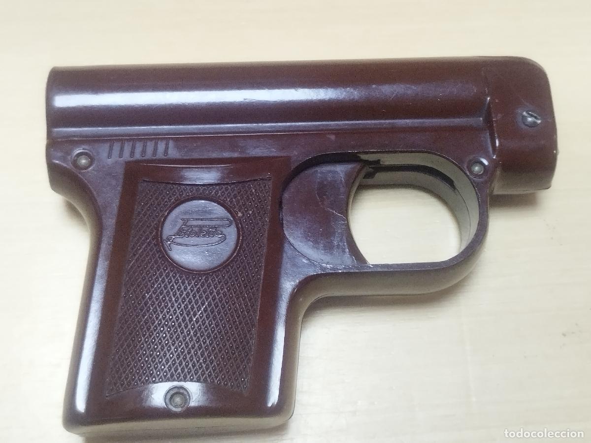 Briquets: BZB 142 MECHERO TIPO PISTOLA. ALEMANIA. MARCA PISTOLETTA. MEDIDAS APROX 9,5*7 CM. BUENA CONSERVACION