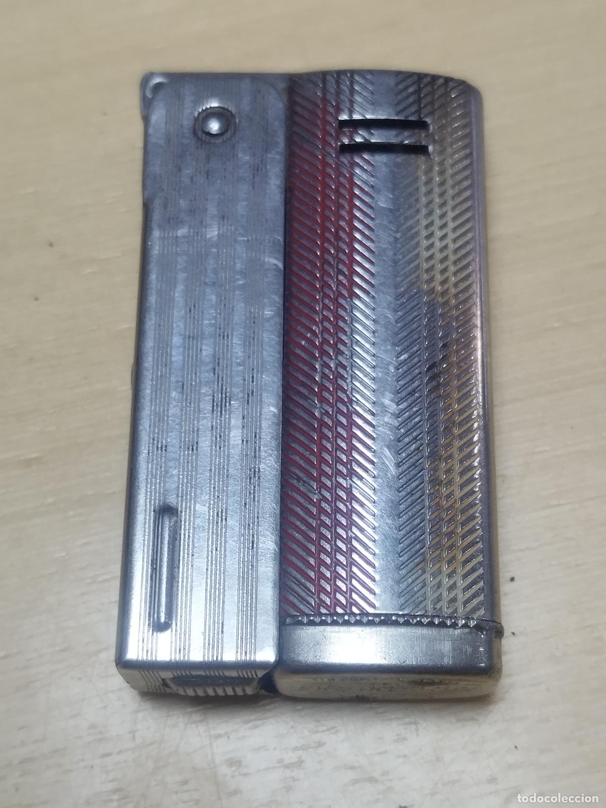Briquets: BZB 133 MECHERO IMCO STREAMING 6800. AUSTRIA. DIBUJO LLAVE. MEDIDAS APROX 6*3 CM. BUENA CONSERVACION
