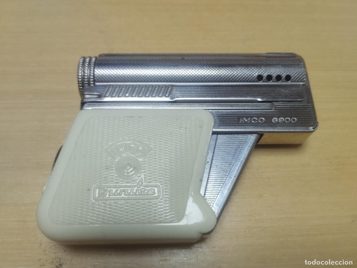 Isqueiros: BZB 127 MECHERO TIPO PISTOLA CACHAS BLANCAS. IMCO SUNLITE 6900. MEDIDAS APROX 6*7 CM. BUENA CALIDAD