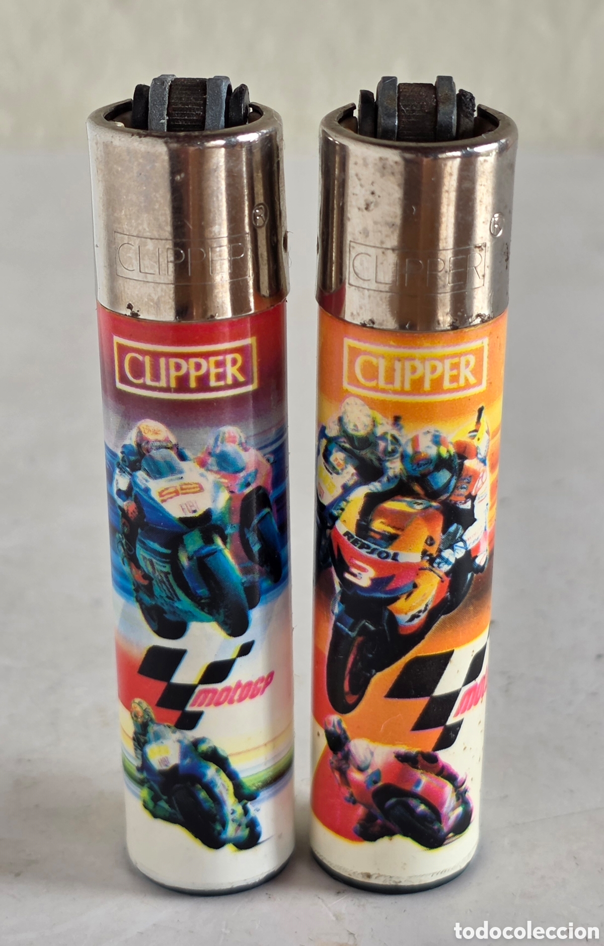 Mecheros: 2 Encendedores Clipper publicidad Mundial Moto GP Pilotos 99 Lorenzo 3 Pedrosa Carreras Motociclismo