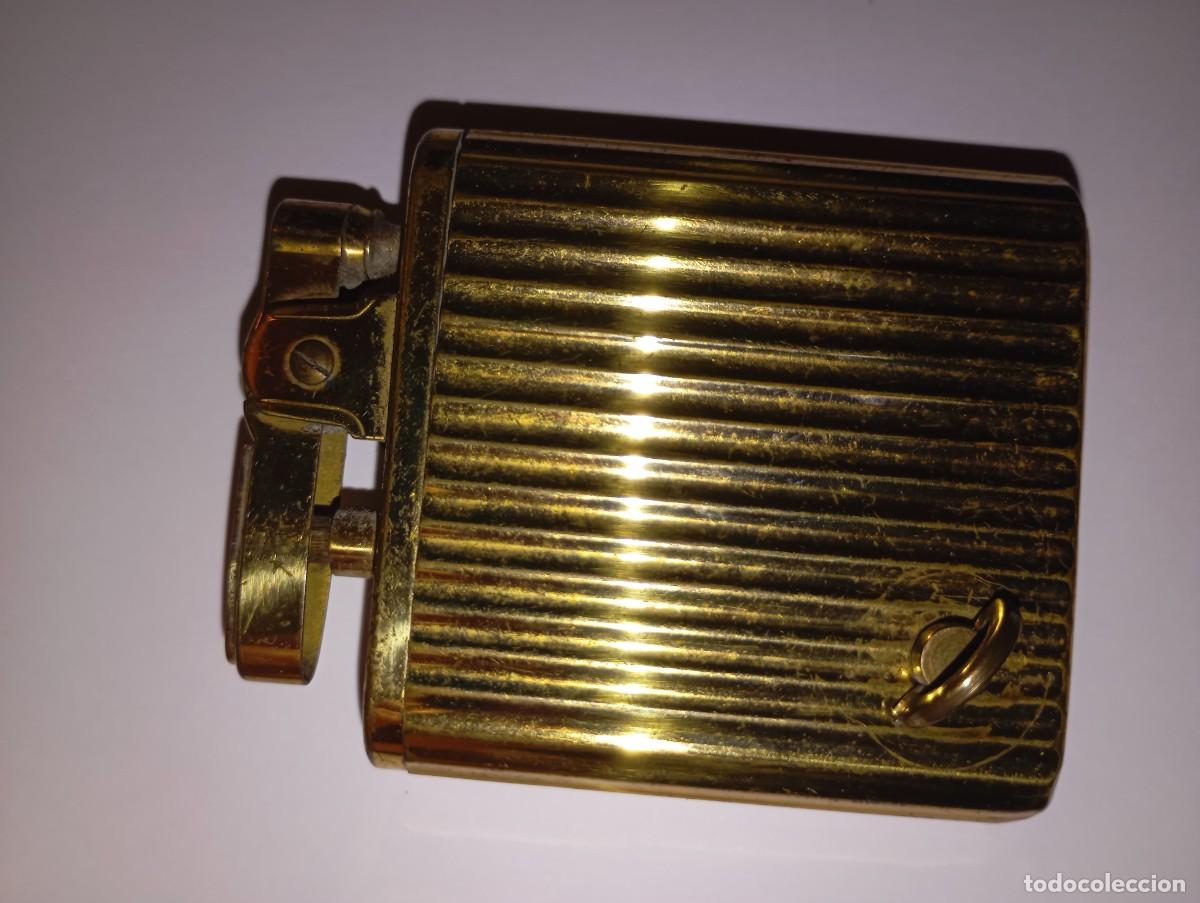 Mecheros: Mechero musical ingles (Musical Lighter, Pat. Pending y la corona inglesa en la base)