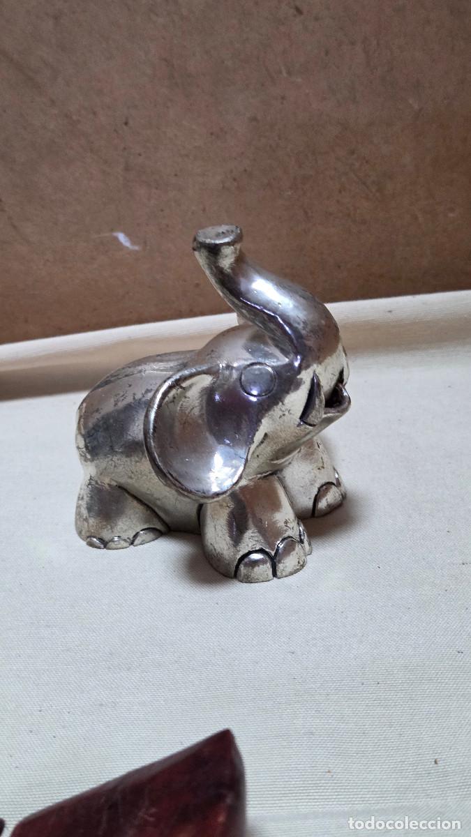 Mecheros: elefante de color de plata