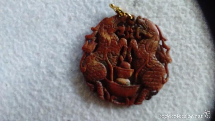 Coleccionismo de minerales: Amuleto oriental calado - Foto 1