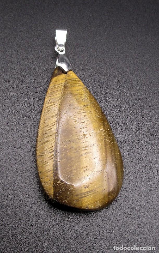 Coleccionismo de minerales: Colgante de Ojo de Tigre - 13 gr. - 6,2 cm de largo con engarce x 2,5 cm de ancho