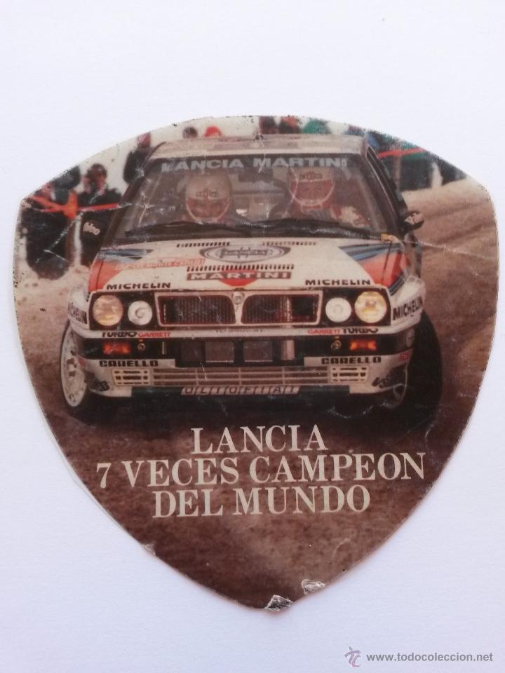 Pegatinas de colecci&oacute;n: Pegatina de lancia 7 veces campeon del mundo 10 x 9,5 cms.pegada a un plastico