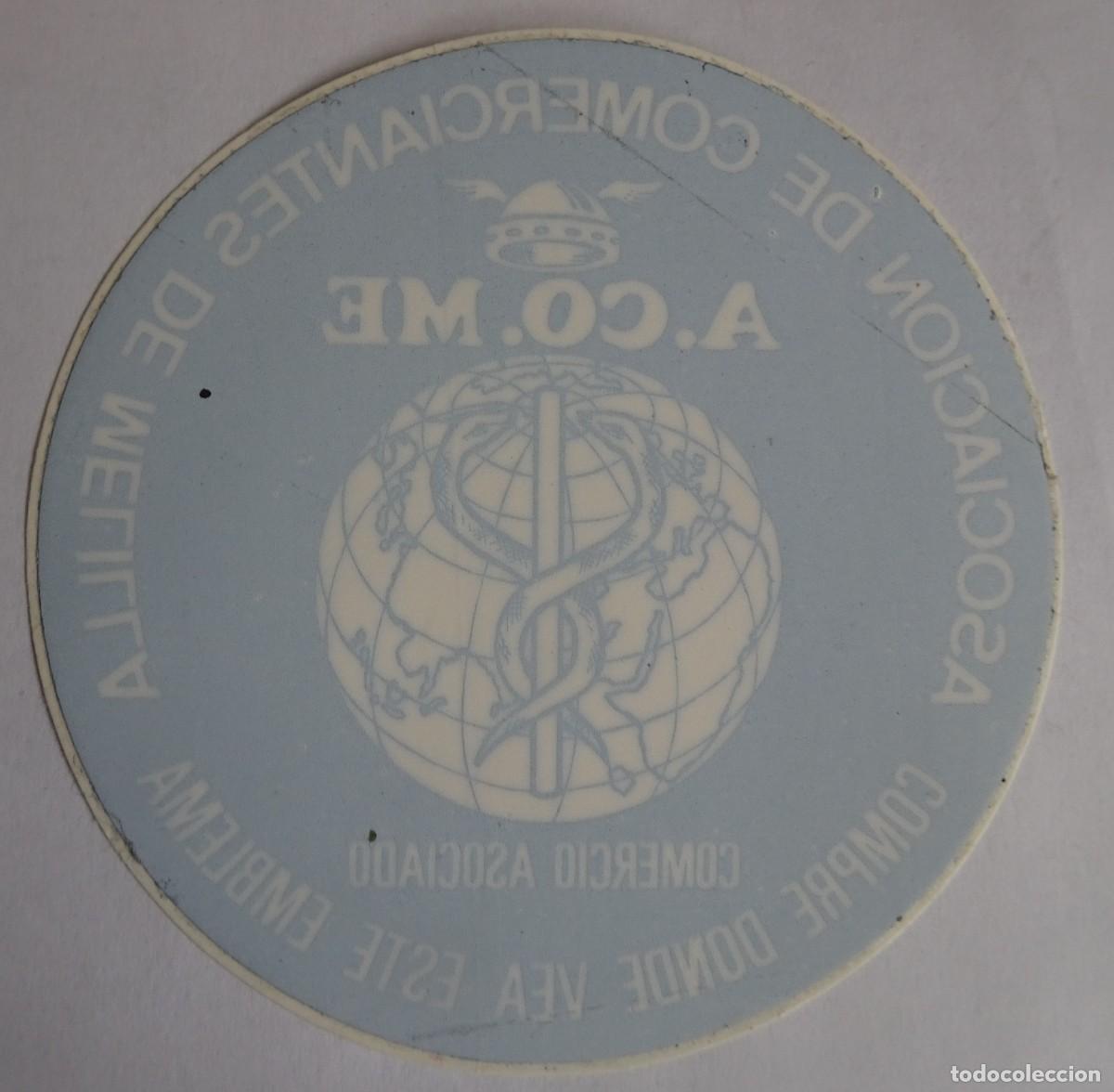 Collection stickers: PEGATINA, ADHESIVO, ASOCIACI&Oacute;N DE COMERCIANTES DE MELILLA, INVERTIDA PARA CRISTAL, VER FOTOS
