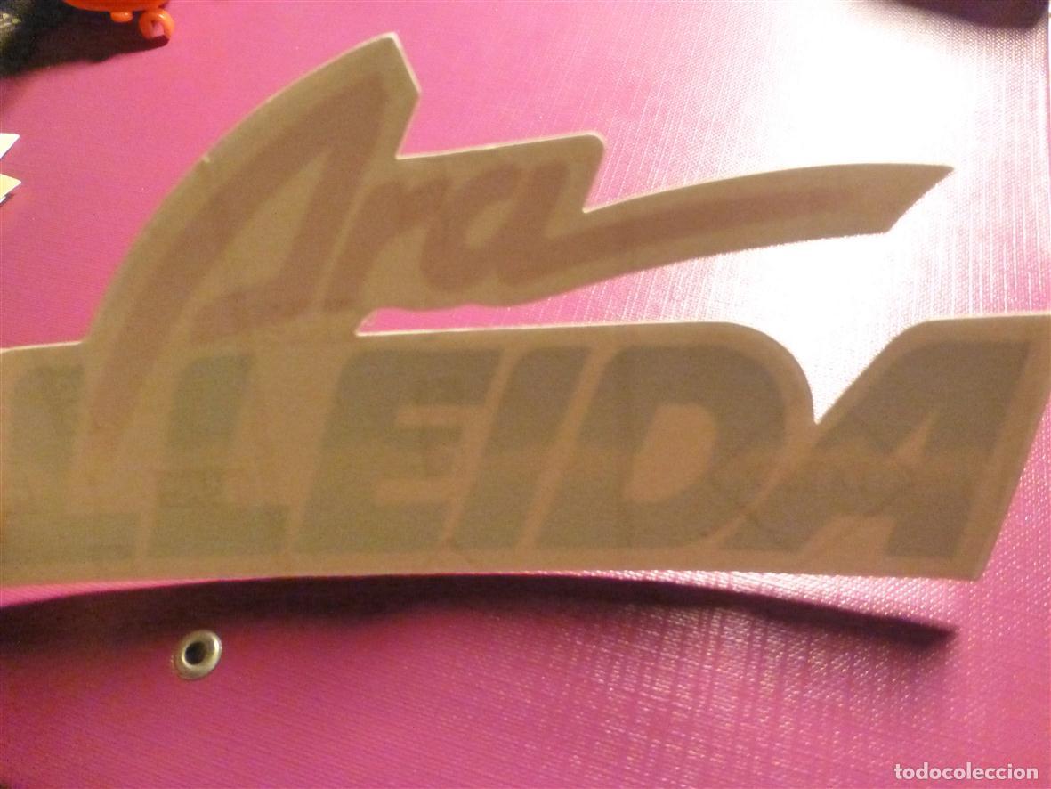 Pegatinas de colecci&oacute;n: Pegatina - Adhesivo - Localidad - m&acute;agrades ! - L&eacute;rida - Ara Lleida - 20 x 10 cm.