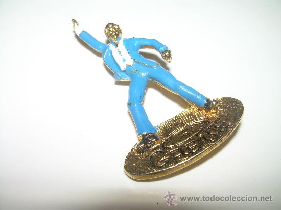 Collection pins: INSIGNIA.....GREASE.