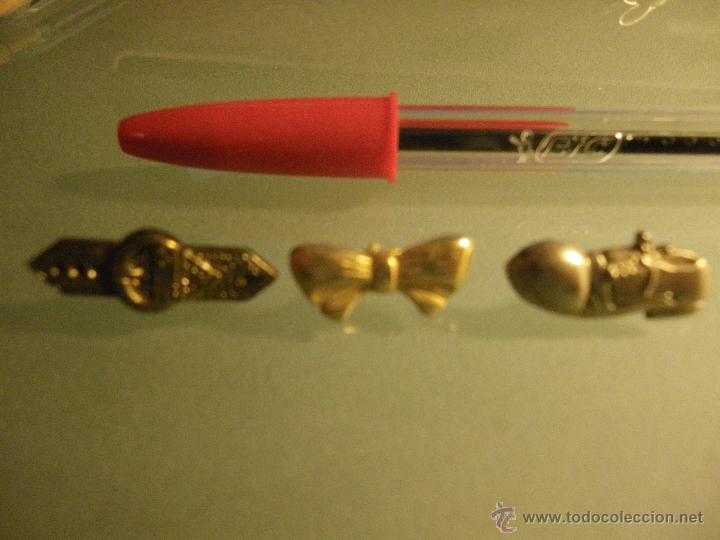 Pins de cole&ccedil;&atilde;o: 3 pins: lazo, zapato y cintur&oacute;n