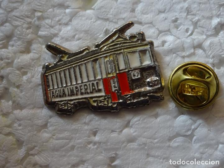 Pins e Spille di collezione: PIN DE TRENES FERROCARRILES. TREN LOCOMOTORA ESPA&Ntilde;A. RENFE. TRANV&Iacute;A PUBLICIDAD AGUA IMPERIAL